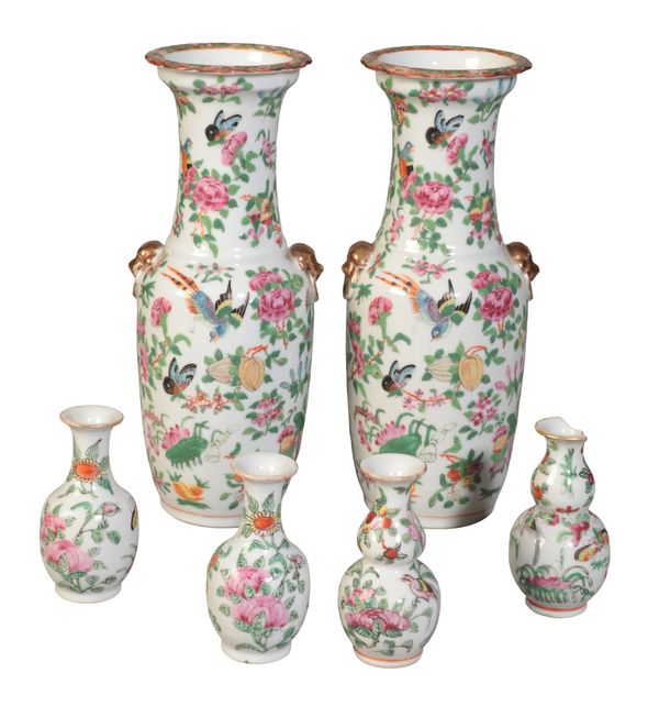 A PAIR OF CANTONESE FAMILLE ROSE VASES