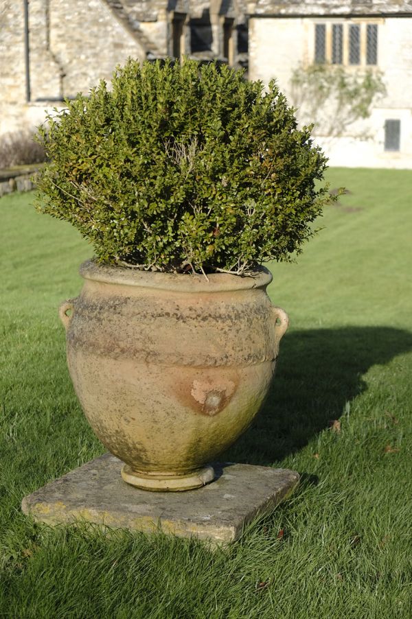 A ROMAN STYLE TERRACOTTA GARDEN URN