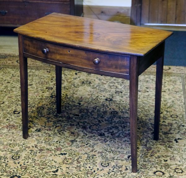 A LATE GEORGE III MAHOGANY BOW-FRONT SIDE TABLE