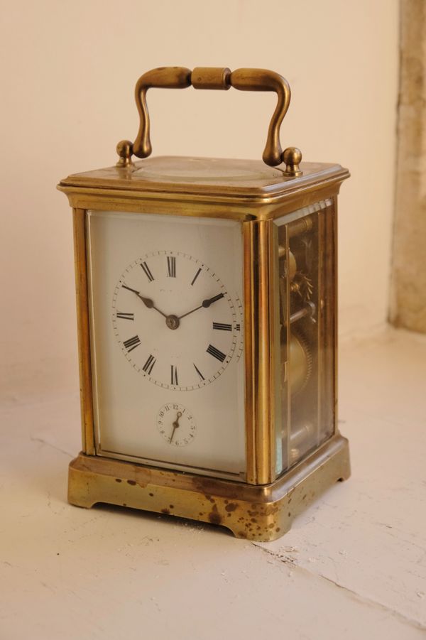 A BRASS CASED CARRIAGE CLOCK