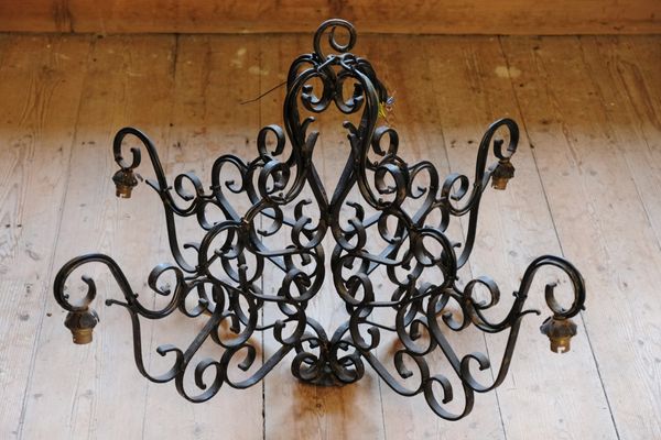 A WROUGHT IRON HANGING LANTERN