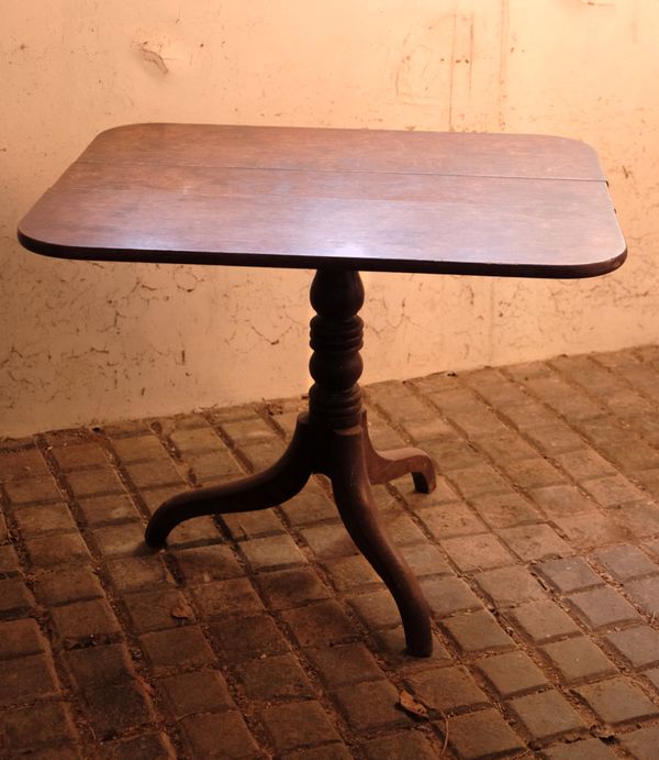 AN OAK TRIPOD TABLE