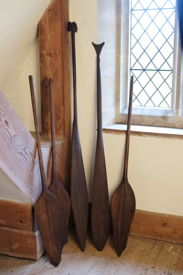 A GROUP OF FIVE POLYNESIAN PADDLES