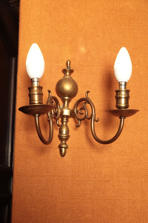 A SET OF SIX GEORGE I STYLE BRASS WALL LIGHTS