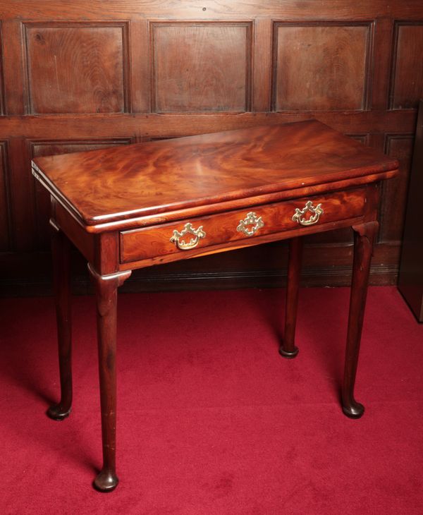 A GEORGE II YEW WOOD TEA TABLE