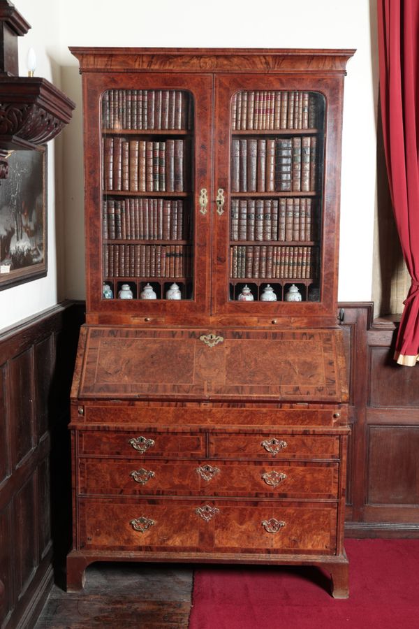 A GEORGE I BURR WALNUT BUREAU BOOKCASE