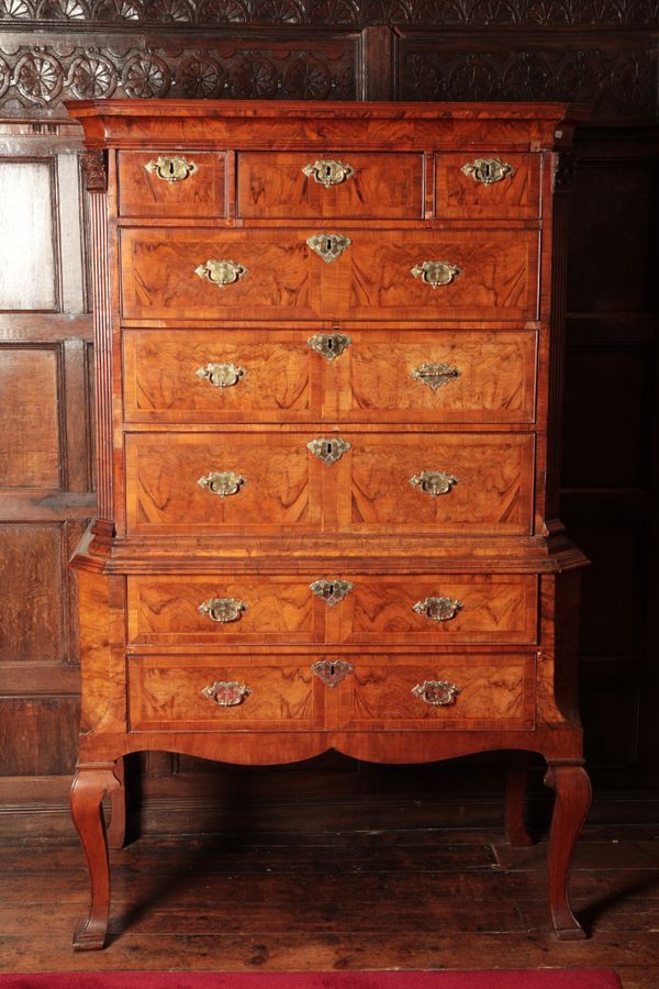 A GEORGE I WALNUT CHEST ON STAND