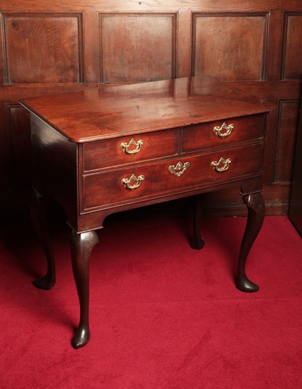 A GEORGE II MAHOGANY LOW BOY