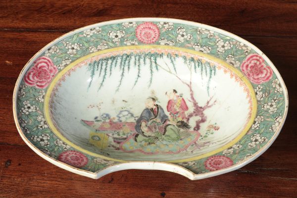 A CHINESE EXPORT FAMILLE ROSE BARBER'S BOWL
