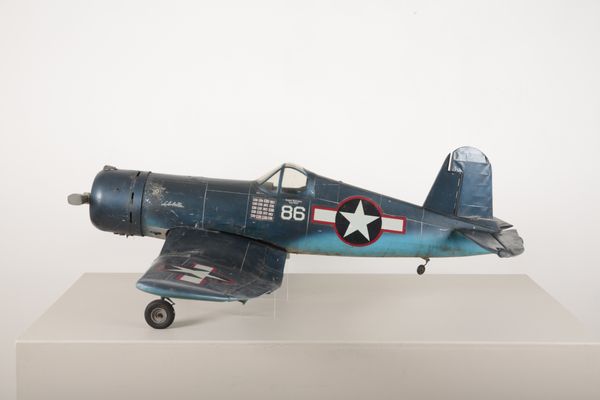 A FIBREGLASS AND WOODEN MODEL OF USMC MAJOR GREGORY BOYINGTON’S VOUGHT F4U-1A CORSAIR