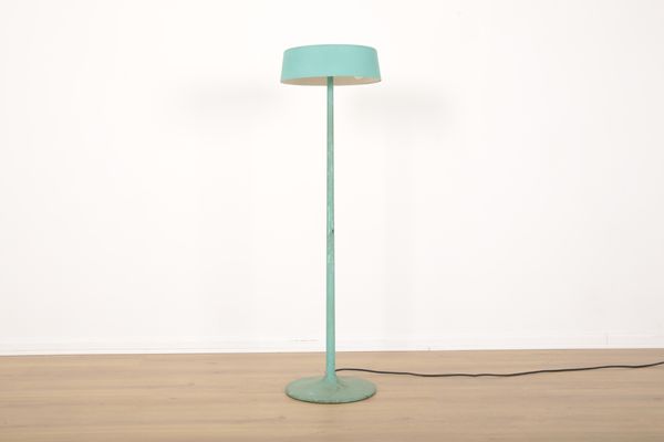 A METAL TURQUOISE FLOOR LAMP BY HABITAT