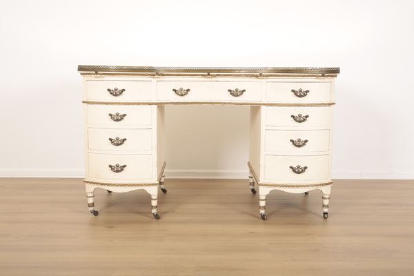 A WHITE PAINTED SERPENTINE FRONTED PEDESTAL DRESSING TABLE