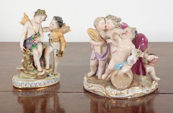 A MEISSEN PORCELAIN FIGURE OF A BACCHIC PUTTO AND COMPANIONS