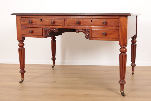 A VICTORIAN MAHOGANY DESK