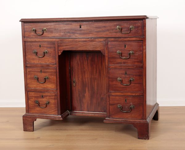 A GEORGE III MAHOGANY KNEEHOLE DESK