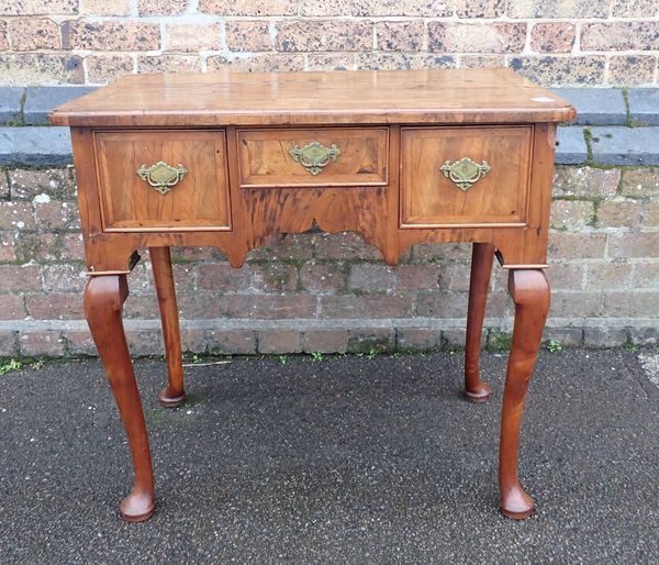 A GEORGE II WALNUT LOWBOY, WITH THREE DRAWERS