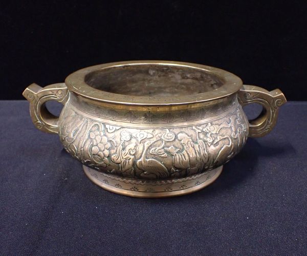 A BRASS CENSER, WITH SCENES IN RELIEF