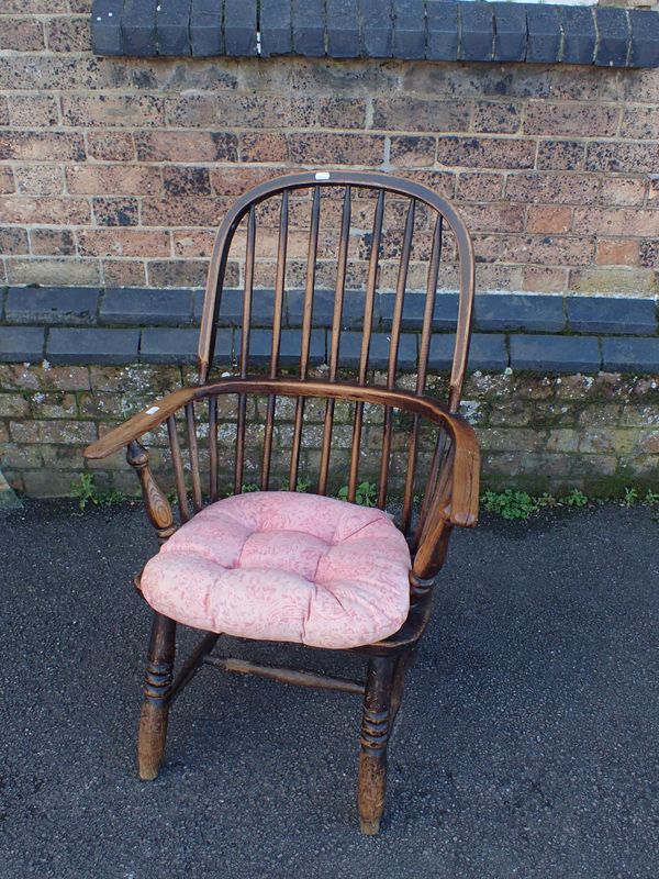 A 19TH CENTURY STAINED ASH AND ELM WINDSOR ARMCHAIR