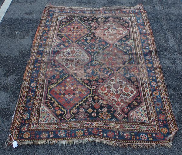 AN ANTIQUE QASHGAI RUG