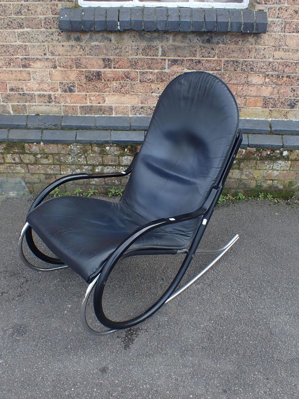 A MODERNIST STEEL-FRAMED ROCKING CHAIR