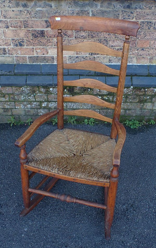 A LANCASHIRE LADDERBACK ROCKING CHAIR