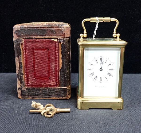 A BRASS-CASED FRENCH CARRIAGE CLOCK