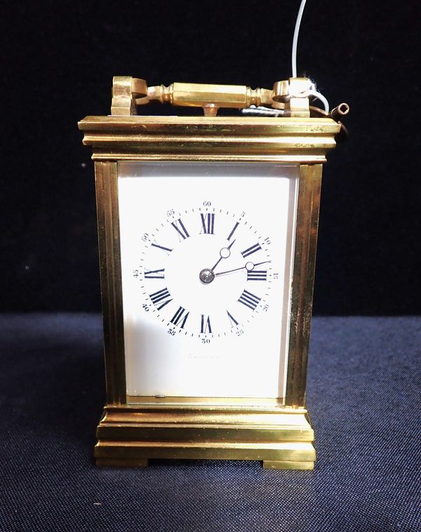 A BRASS-CASED FRENCH CARRIAGE CLOCK