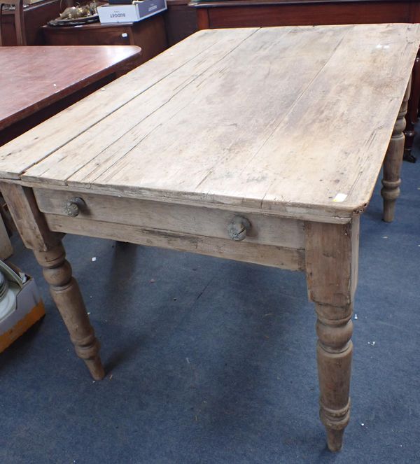 A PINE FARMHOUSE KITCHEN TABLE