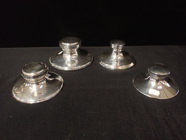 FOUR SILVER CAPSTAN INKWELLS