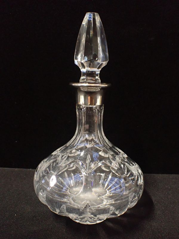 A MODERN SILVER-COLLARED DECANTER