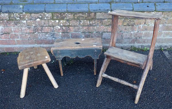 A 19TH CENTURY PLANK STOOL, WITH OLD PAINTED SURFACE