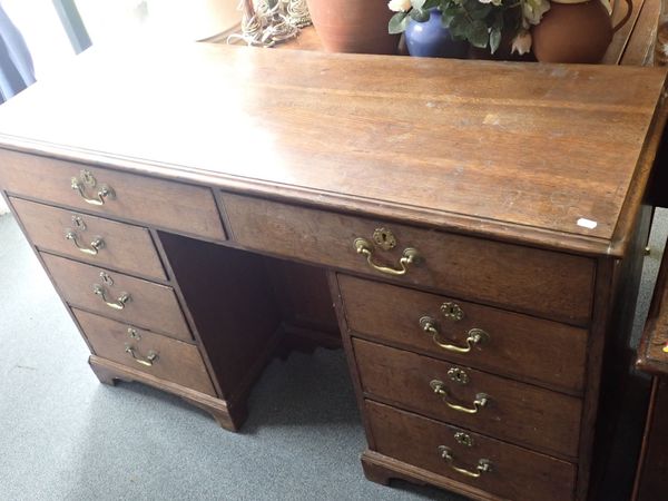 A GEORGE III  OAK DRESSER, WITH RECESSED CUPBOARD