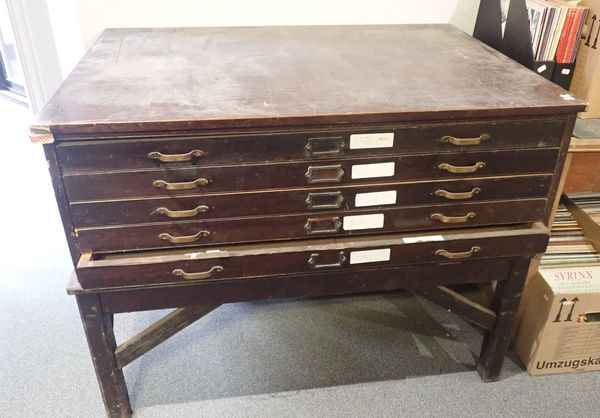 A STAINED PINE PLAN CHEST