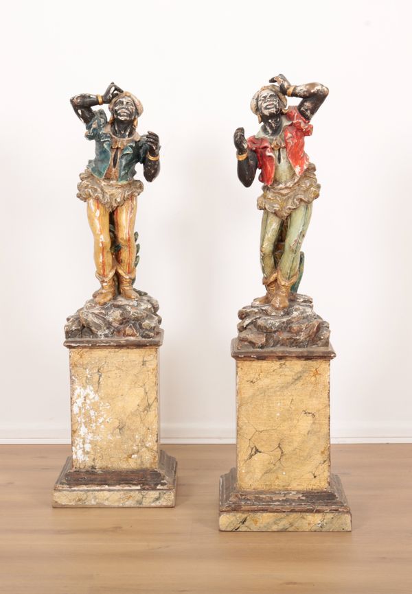 A PAIR OF 19TH CENTURY ITALIAN PAINTED AND CARVED WOOD ‘MOORISH’ FIGURES