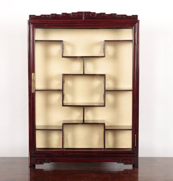 A CHINESE ROSEWOOD DISPLAY CABINET