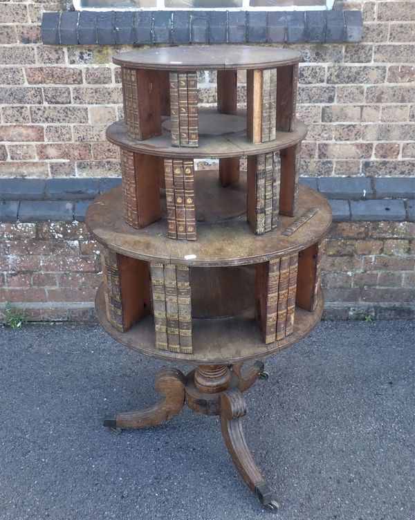 A 19TH CENTURY OAK REVOLVING  CIRCULAR BOOKCASE