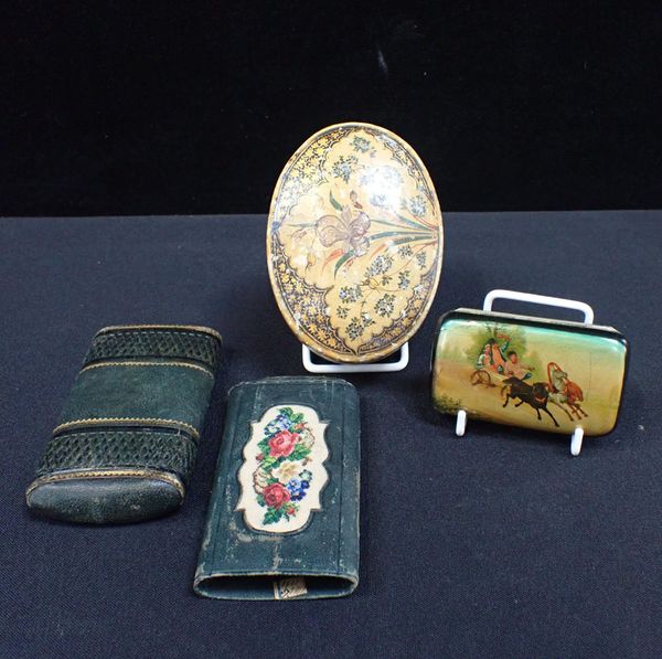 A LACQUER CIGARETTE CASE, PAINTED WITH AN EASTERN SCENE