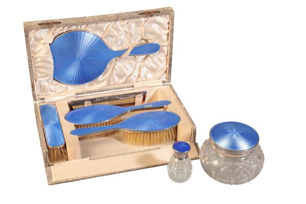 A GEORGE V SILVER & BLUE ENAMELLED DRESSING TABLE SET