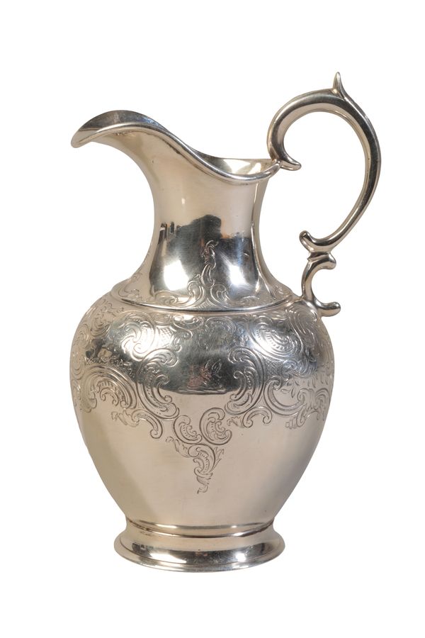 A VICTORIAN SILVER JUG