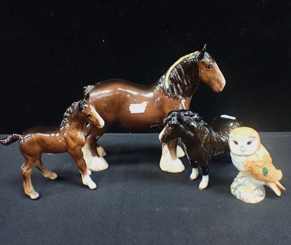 A BESWICK POTTERY WORKING HORSE