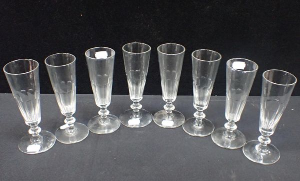 A SET OF EIGHT CHAMPAGNE FLUTES