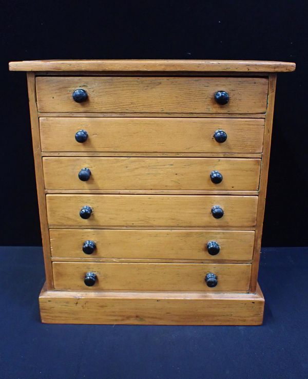 A PINE SIX DRAWER COLLECTOR'S CHEST