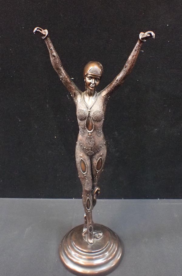 AN ART DECO STYLE FIGURE