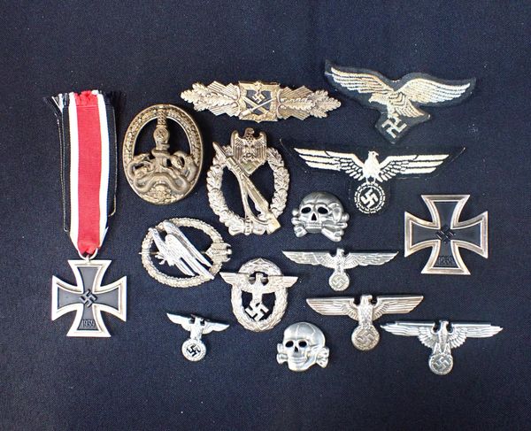 A COLLECTION OF GERMAN BADGES AND MEDALS