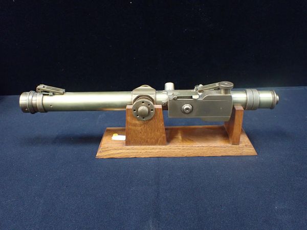 A BRASS MILITARY TELESCOPIC SIGHT