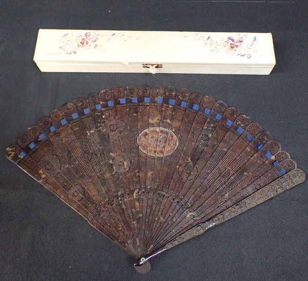 A CANTONESE PIERCED AND CARVED TORTOISESHELL FAN