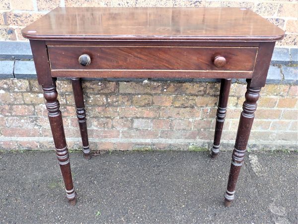 A REGENCY MAHOGANY SIDE TABLE, ON TURNED LEGS