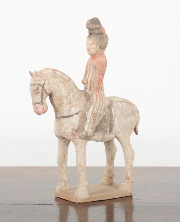 A CHINESE PAINTED POTTERY HORSE AND RIDER