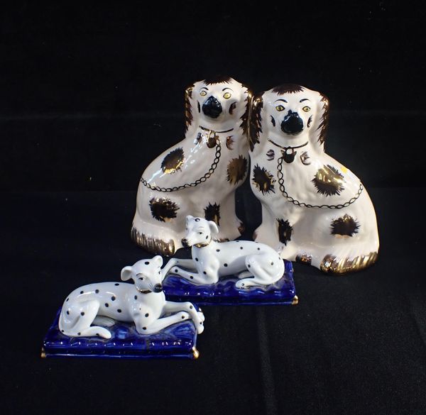 PAIR OF STAFFORDSHIRE STYLE DOGS