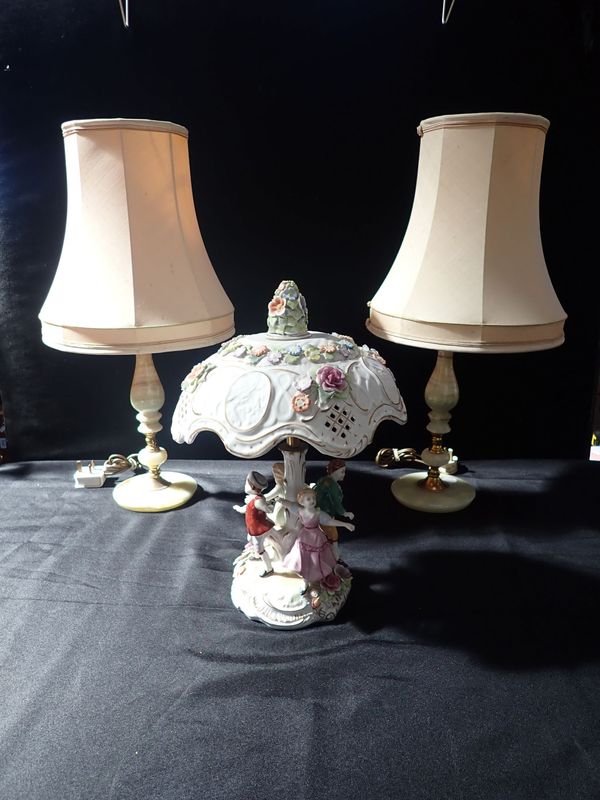 A PAIR OF ONYX AND BRASS TABLE LAMPS